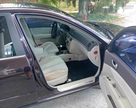 Коричневый Хендай Соната, объемом двигателя 2.4 л и пробегом 200 тыс. км за 4750 $, фото 4 на Automoto.ua