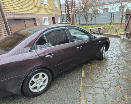 Коричневый Хендай Соната, объемом двигателя 2 л и пробегом 234 тыс. км за 4950 $, фото 4 на Automoto.ua