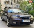 Коричневый Хендай Соната, объемом двигателя 2.36 л и пробегом 246 тыс. км за 4500 $, фото 1 на Automoto.ua