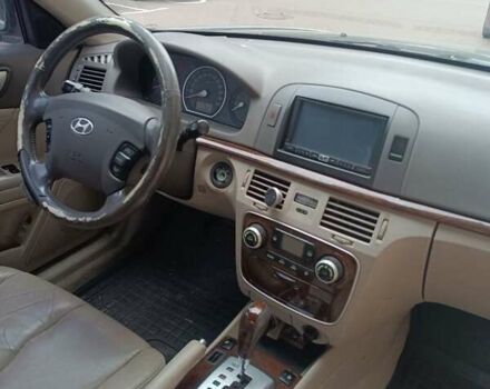 Коричневый Хендай Соната, объемом двигателя 2.36 л и пробегом 282 тыс. км за 6000 $, фото 10 на Automoto.ua