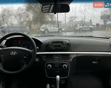 Коричневый Хендай Соната, объемом двигателя 2 л и пробегом 243 тыс. км за 5950 $, фото 12 на Automoto.ua