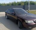 Коричневый Хендай Соната, объемом двигателя 2 л и пробегом 180 тыс. км за 5400 $, фото 1 на Automoto.ua