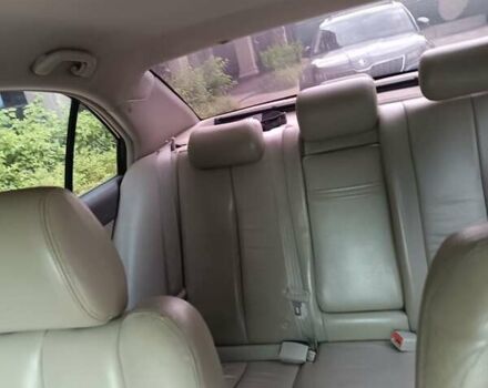 Коричневый Хендай Соната, объемом двигателя 2.36 л и пробегом 282 тыс. км за 6000 $, фото 16 на Automoto.ua