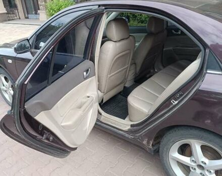 Коричневый Хендай Соната, объемом двигателя 2.36 л и пробегом 282 тыс. км за 6000 $, фото 13 на Automoto.ua