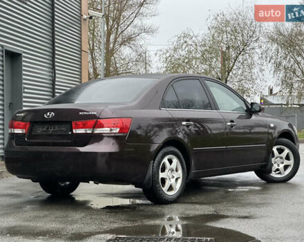 Коричневый Хендай Соната, объемом двигателя 2 л и пробегом 243 тыс. км за 5950 $, фото 6 на Automoto.ua
