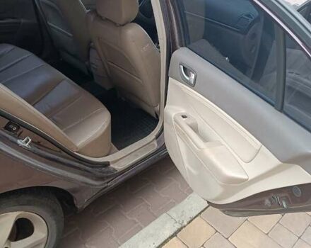 Коричневый Хендай Соната, объемом двигателя 2.36 л и пробегом 282 тыс. км за 6000 $, фото 12 на Automoto.ua