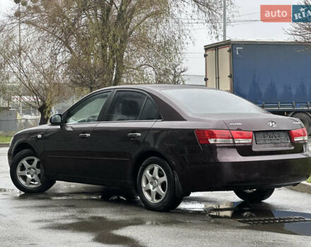 Коричневый Хендай Соната, объемом двигателя 2 л и пробегом 243 тыс. км за 5950 $, фото 7 на Automoto.ua