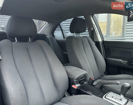 Коричневый Хендай Соната, объемом двигателя 2 л и пробегом 243 тыс. км за 5950 $, фото 7 на Automoto.ua