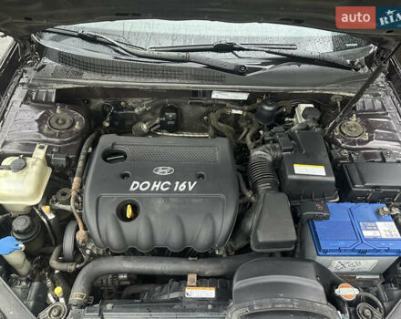 Коричневый Хендай Соната, объемом двигателя 2 л и пробегом 243 тыс. км за 5950 $, фото 14 на Automoto.ua