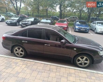 Коричневый Хендай Соната, объемом двигателя 2.36 л и пробегом 282 тыс. км за 6000 $, фото 3 на Automoto.ua