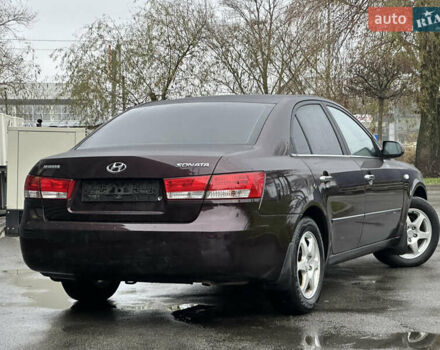 Коричневый Хендай Соната, объемом двигателя 2 л и пробегом 243 тыс. км за 5950 $, фото 10 на Automoto.ua
