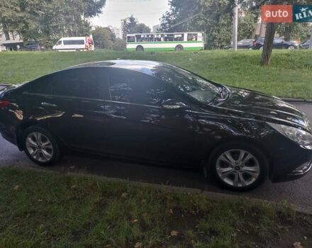 Коричневый Хендай Соната, объемом двигателя 2 л и пробегом 235 тыс. км за 9500 $, фото 2 на Automoto.ua