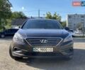 Коричневый Хендай Соната, объемом двигателя 2.36 л и пробегом 210 тыс. км за 9500 $, фото 1 на Automoto.ua