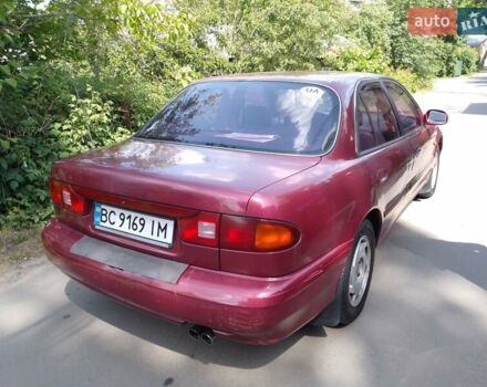 Красный Хендай Соната, объемом двигателя 3 л и пробегом 230 тыс. км за 1300 $, фото 4 на Automoto.ua