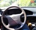 Красный Хендай Соната, объемом двигателя 3 л и пробегом 230 тыс. км за 1300 $, фото 1 на Automoto.ua