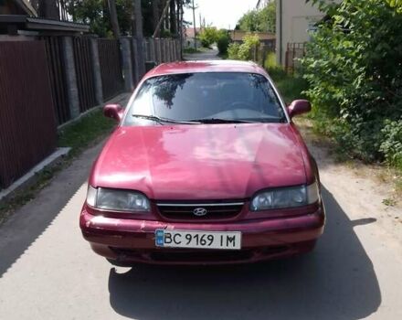 Красный Хендай Соната, объемом двигателя 3 л и пробегом 230 тыс. км за 1300 $, фото 7 на Automoto.ua