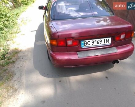 Красный Хендай Соната, объемом двигателя 3 л и пробегом 230 тыс. км за 1300 $, фото 6 на Automoto.ua