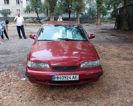 Червоний Хендай Соната, об'ємом двигуна 2 л та пробігом 1 тис. км за 1500 $, фото 1 на Automoto.ua