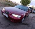 Червоний Хендай Соната, об'ємом двигуна 2 л та пробігом 190 тис. км за 1999 $, фото 1 на Automoto.ua