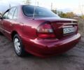 Червоний Хендай Соната, об'ємом двигуна 2 л та пробігом 190 тис. км за 1999 $, фото 15 на Automoto.ua