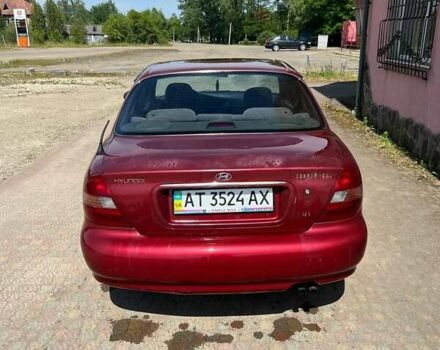 Красный Хендай Соната, объемом двигателя 2 л и пробегом 230 тыс. км за 1600 $, фото 2 на Automoto.ua