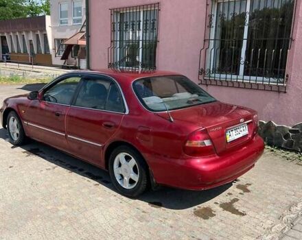 Красный Хендай Соната, объемом двигателя 2 л и пробегом 230 тыс. км за 1600 $, фото 3 на Automoto.ua