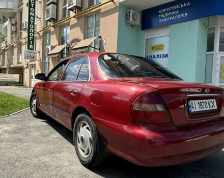 Красный Хендай Соната, объемом двигателя 2 л и пробегом 50 тыс. км за 1700 $, фото 5 на Automoto.ua