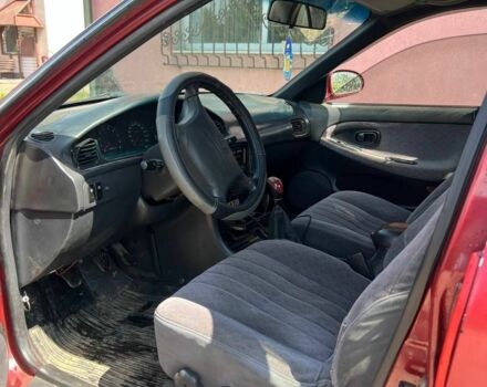 Красный Хендай Соната, объемом двигателя 2 л и пробегом 230 тыс. км за 1600 $, фото 2 на Automoto.ua