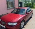 Красный Хендай Соната, объемом двигателя 2 л и пробегом 230 тыс. км за 1600 $, фото 1 на Automoto.ua
