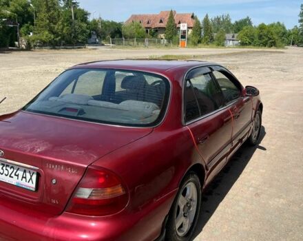 Красный Хендай Соната, объемом двигателя 2 л и пробегом 230 тыс. км за 1600 $, фото 1 на Automoto.ua