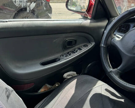 Красный Хендай Соната, объемом двигателя 2 л и пробегом 50 тыс. км за 1700 $, фото 9 на Automoto.ua