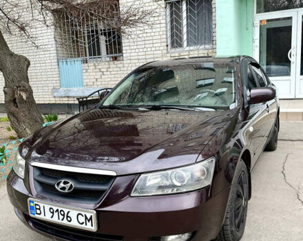 Красный Хендай Соната, объемом двигателя 2.4 л и пробегом 253 тыс. км за 5500 $, фото 1 на Automoto.ua