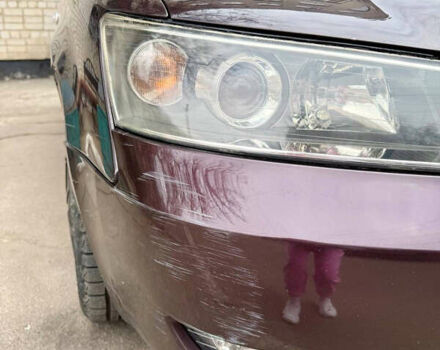 Красный Хендай Соната, объемом двигателя 2.4 л и пробегом 253 тыс. км за 5500 $, фото 8 на Automoto.ua