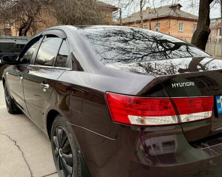 Красный Хендай Соната, объемом двигателя 2.4 л и пробегом 253 тыс. км за 5500 $, фото 6 на Automoto.ua