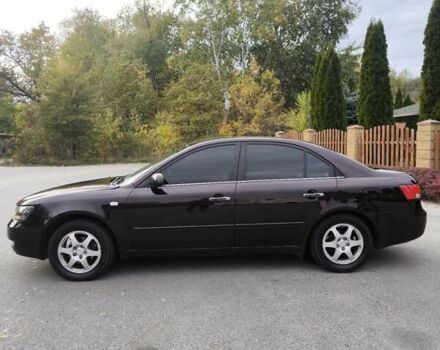 Красный Хендай Соната, объемом двигателя 2.36 л и пробегом 300 тыс. км за 3899 $, фото 6 на Automoto.ua