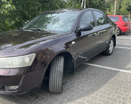 Красный Хендай Соната, объемом двигателя 2.36 л и пробегом 344 тыс. км за 5650 $, фото 2 на Automoto.ua