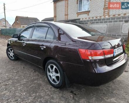 Червоний Хендай Соната, об'ємом двигуна 2 л та пробігом 280 тис. км за 4999 $, фото 11 на Automoto.ua