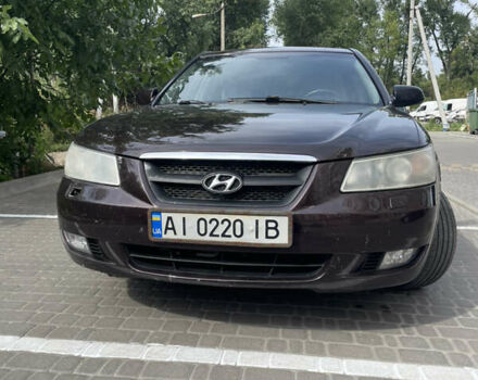 Красный Хендай Соната, объемом двигателя 2.36 л и пробегом 344 тыс. км за 5650 $, фото 1 на Automoto.ua