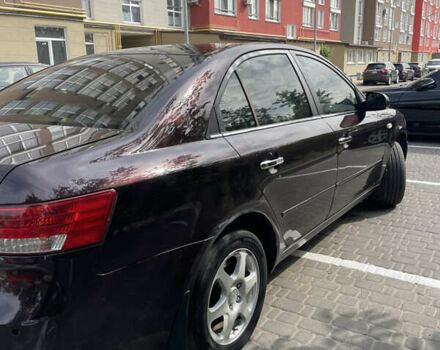 Красный Хендай Соната, объемом двигателя 2.36 л и пробегом 344 тыс. км за 5650 $, фото 5 на Automoto.ua