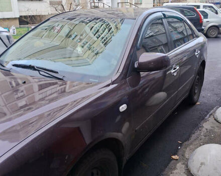 Красный Хендай Соната, объемом двигателя 2.36 л и пробегом 270 тыс. км за 6000 $, фото 6 на Automoto.ua