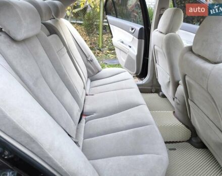 Хендай Соната 2006 у Казатине на Automoto.ua Червоний Хендай Соната, об'ємом двигуна 2 л та пробігом 280 тис. км за 5200 $, фото 18 на Automoto.ua