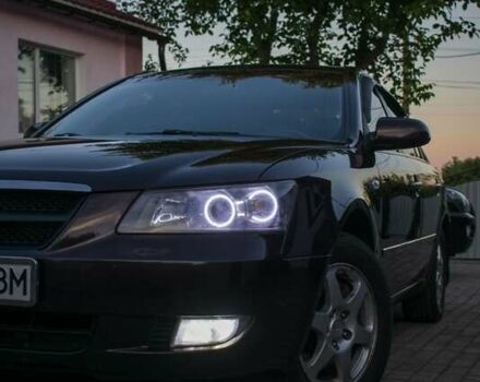 Червоний Хендай Соната, об'ємом двигуна 2 л та пробігом 198 тис. км за 6500 $, фото 1 на Automoto.ua