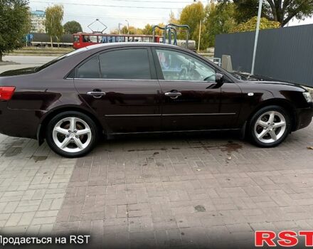 Червоний Хендай Соната, об'ємом двигуна 2.4 л та пробігом 253 тис. км за 5800 $, фото 3 на Automoto.ua