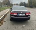 Красный Хендай Соната, объемом двигателя 2.4 л и пробегом 252 тыс. км за 5800 $, фото 4 на Automoto.ua