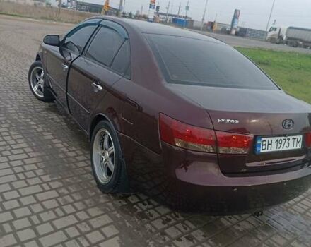 Красный Хендай Соната, объемом двигателя 2.4 л и пробегом 302 тыс. км за 6000 $, фото 4 на Automoto.ua