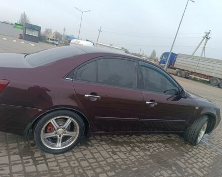 Червоний Хендай Соната, об'ємом двигуна 2.4 л та пробігом 302 тис. км за 6000 $, фото 2 на Automoto.ua