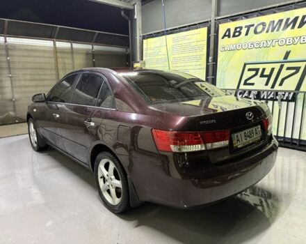 Червоний Хендай Соната, об'ємом двигуна 2.4 л та пробігом 133 тис. км за 8500 $, фото 3 на Automoto.ua