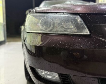 Червоний Хендай Соната, об'ємом двигуна 2.4 л та пробігом 133 тис. км за 8500 $, фото 6 на Automoto.ua