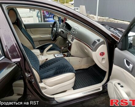 Червоний Хендай Соната, об'ємом двигуна 2.4 л та пробігом 253 тис. км за 5800 $, фото 6 на Automoto.ua