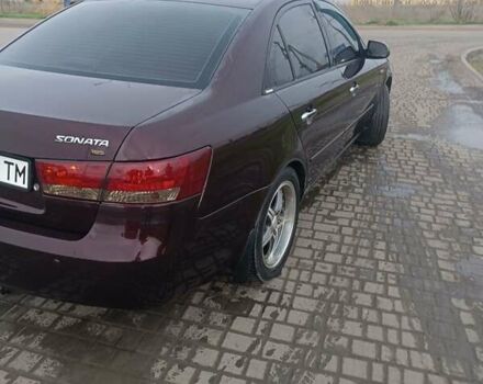 Красный Хендай Соната, объемом двигателя 2.4 л и пробегом 302 тыс. км за 6000 $, фото 5 на Automoto.ua